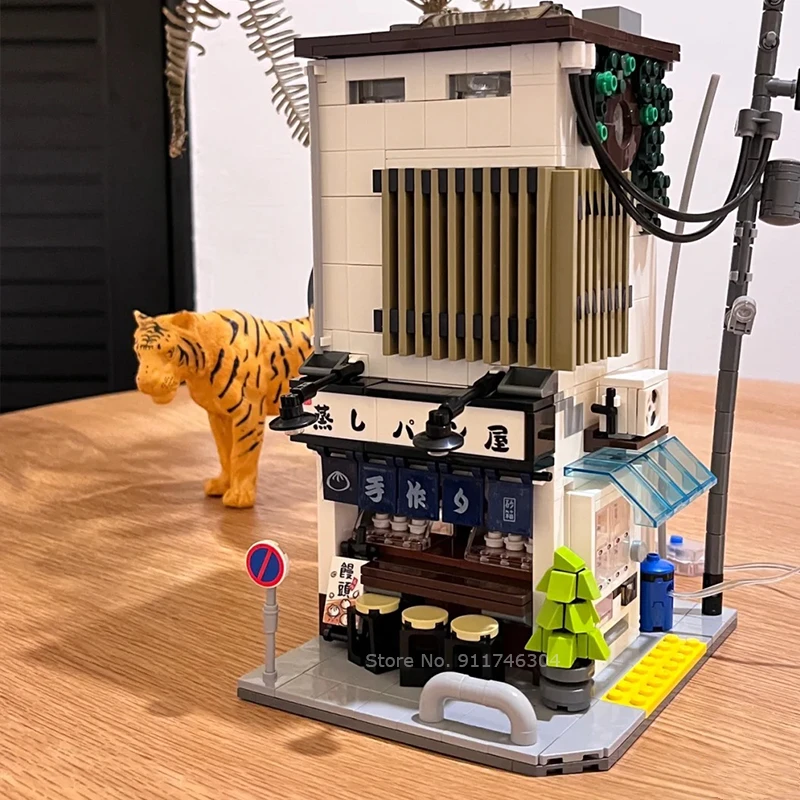 City Street View Architecture Steamed Bun Shop Japanese Style House Model with Light 1108PCS Building Blocks Brick Toy Kids Gift
City Street View Architecture Steamed Bun Shop Japanese Style House Model with Light 1108PCS Building Blocks Brick Toy Kids Gift