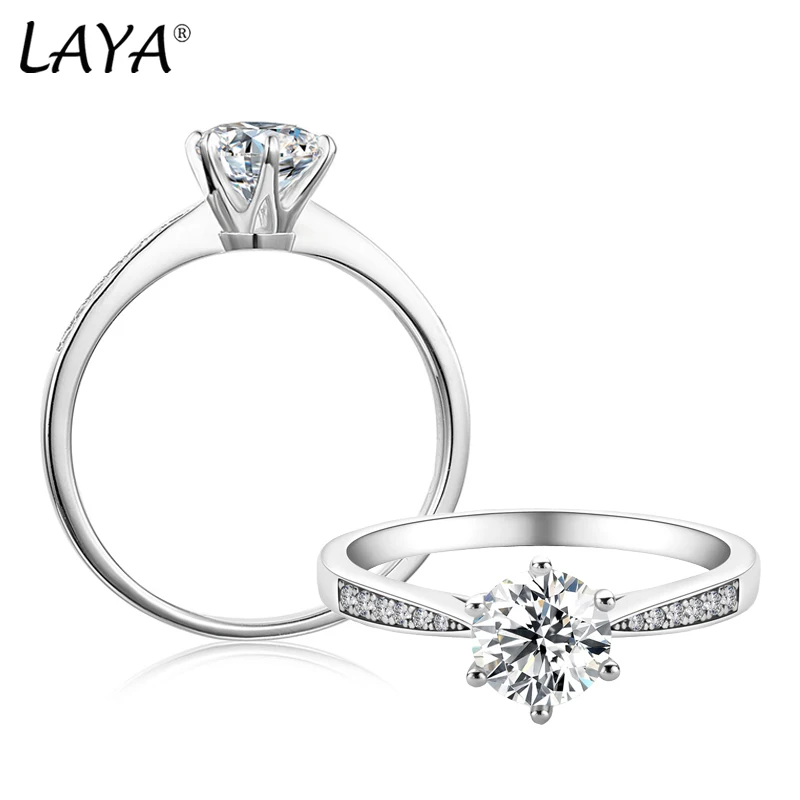 LAYA 1CT1.5CT 2CT D Цвет с полномочиями 925% Серебряное кольцо Круглые кольца из муассанита Невеста Обручальное кольцо Женский подарок ювелирные изд...
LAYA 1CT1.5CT 2CT D Цвет с полномочиями 925% Серебряное кольцо Круглые кольца из муассанита Невеста Обручальное кольцо Женский подарок ювелирные изд...