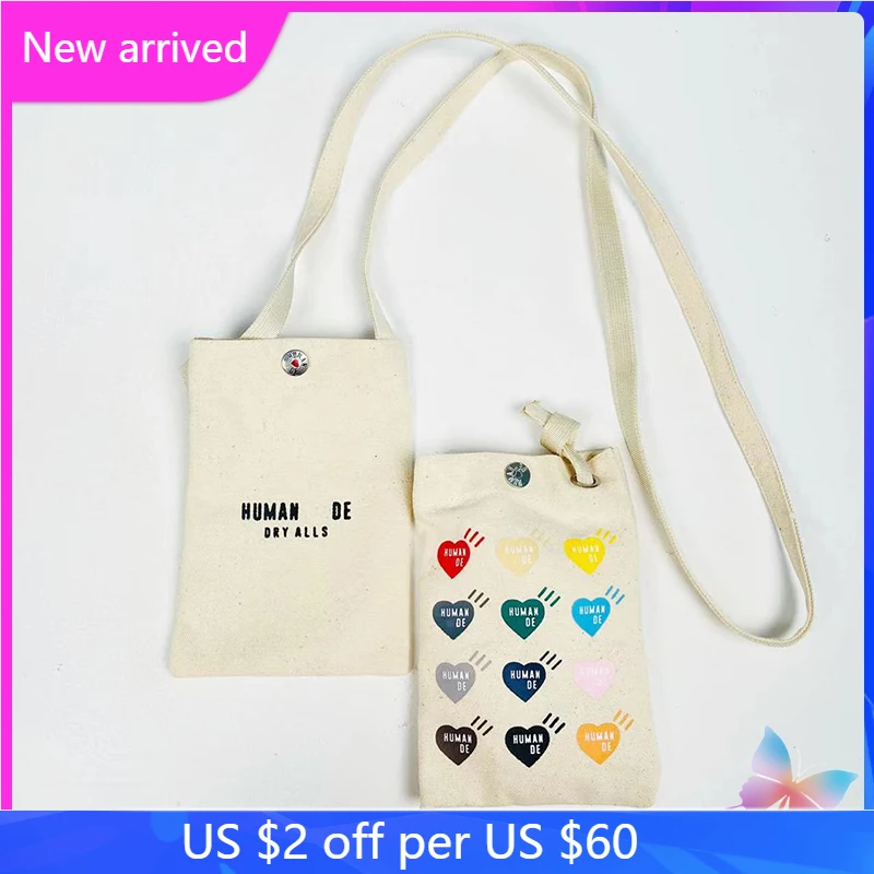 HUMAN MADE Backpack Japanese Love Print Single Shoulder Messenger Bag Couple Cute White Canvas Mobile Phone Key Bags
HUMAN MADE Backpack Japanese Love Print Single Shoulder Messenger Bag Couple Cute White Canvas Mobile Phone Key Bags
