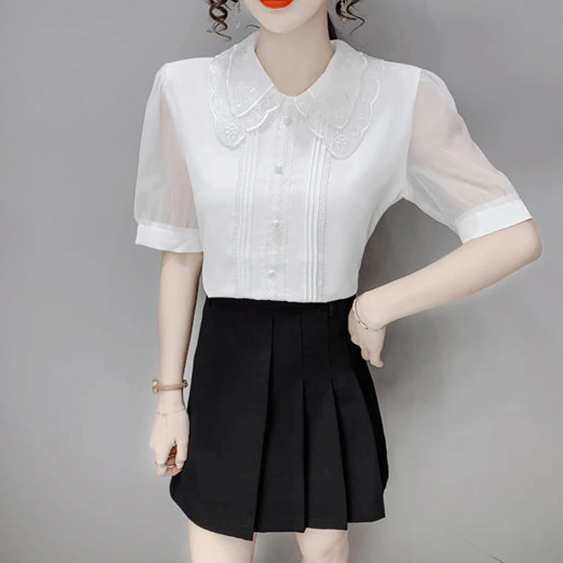 Women's Doll Collar White Shirt Short Sleeve Lace Chiffon Patchwork Button Mesh Slimming 2023 Summer New Korean Version Commuter
Women's Doll Collar White Shirt Short Sleeve Lace Chiffon Patchwork Button Mesh Slimming 2023 Summer New Korean Version Commuter