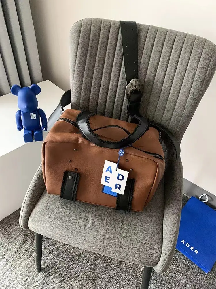 ADER ERROR new high-quality cowhide diagonal bag men and women Torn label messenger bag fashion leisure travel shoulder bag
ADER ERROR new high-quality cowhide diagonal bag men and women Torn label messenger bag fashion leisure travel shoulder bag