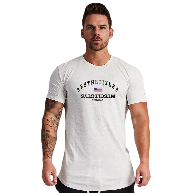 Новая брендовая облегающая футболка Muscleguys для спортзала из чистого хлопка с круглым вырезом и принтом, летняя тонкая футболка 
Новая брендовая облегающая футболка Muscleguys для спортзала из чистого хлопка с круглым вырезом и принтом, летняя тонкая футболка