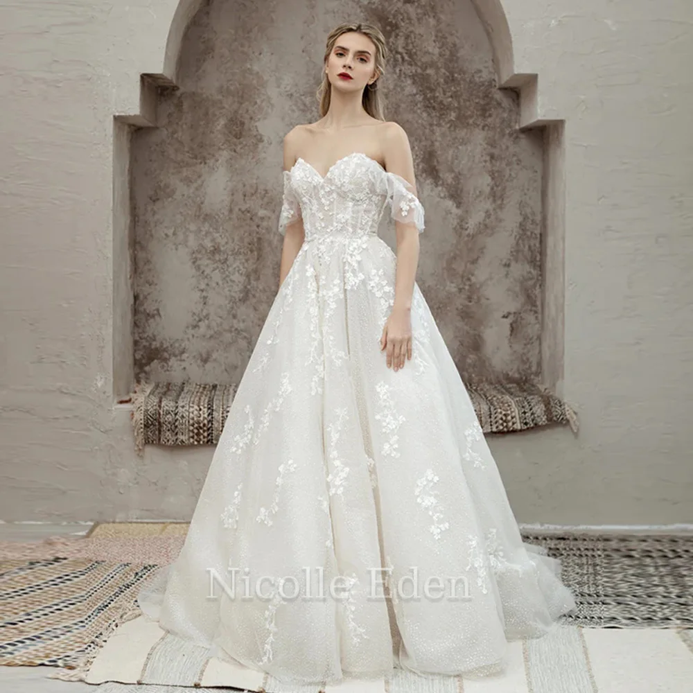 Nicolle Eden Gorgeous A Line Wedding Dresses For Women Off The Shoulder Lace Backless Bridal Gown Robe De Mariée Customised
Nicolle Eden Gorgeous A Line Wedding Dresses For Women Off The Shoulder Lace Backless Bridal Gown Robe De Mariée Customised