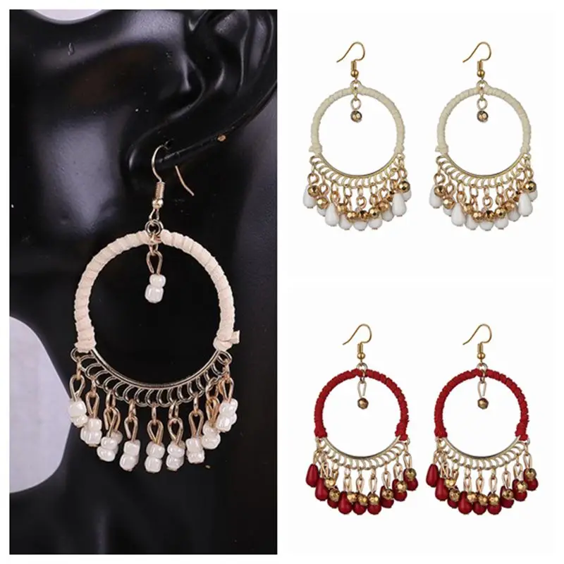 Bohemian Round Water Drop Tassel Earrings Jewelry Ethnic Style Hand Woven Hollow Geometric Statement Earrings for Women Girls
Bohemian Round Water Drop Tassel Earrings Jewelry Ethnic Style Hand Woven Hollow Geometric Statement Earrings for Women Girls