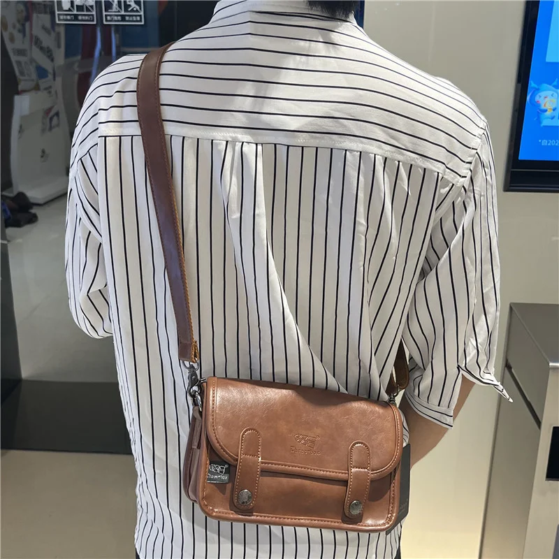 Korean men's type shoulder bag Japanese and Korean trendy men's flip cross body small bag Street diagonal mobile
Korean men's type shoulder bag Japanese and Korean trendy men's flip cross body small bag Street diagonal mobile