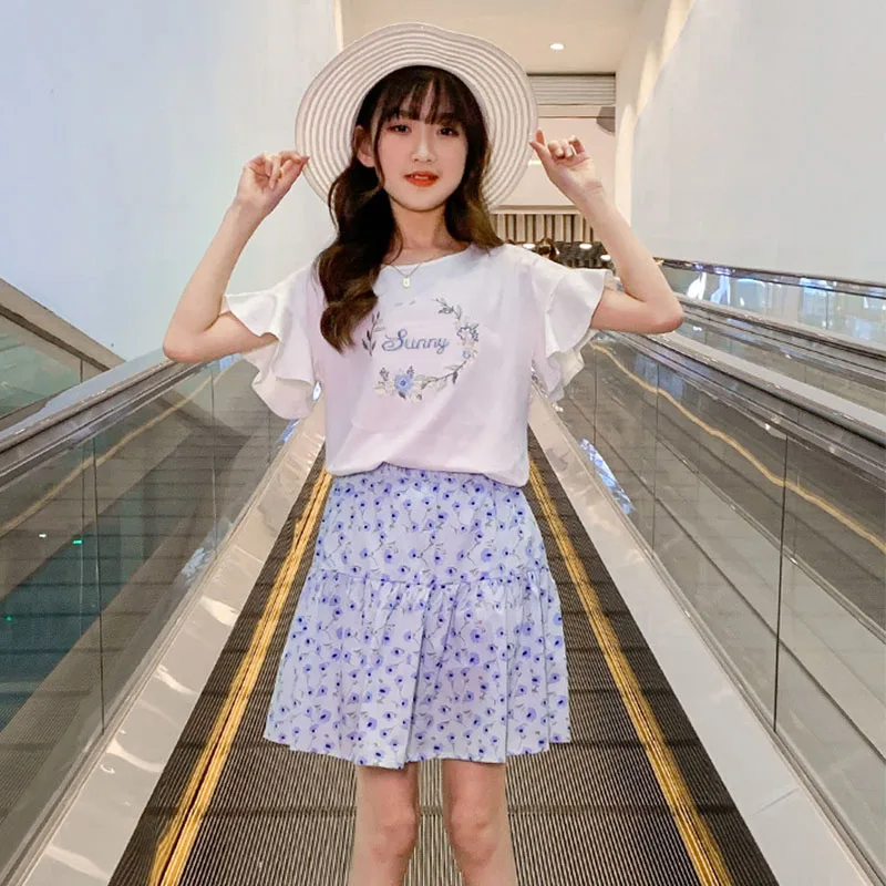 Fashion Kids Girls Clothes Sets 2pcs Flower T Shirts Tops + Print Skirts Teenage Girl Clothing Suits Sumemr 2022 New 3- 14 Years
Fashion Kids Girls Clothes Sets 2pcs Flower T Shirts Tops + Print Skirts Teenage Girl Clothing Suits Sumemr 2022 New 3- 14 Years