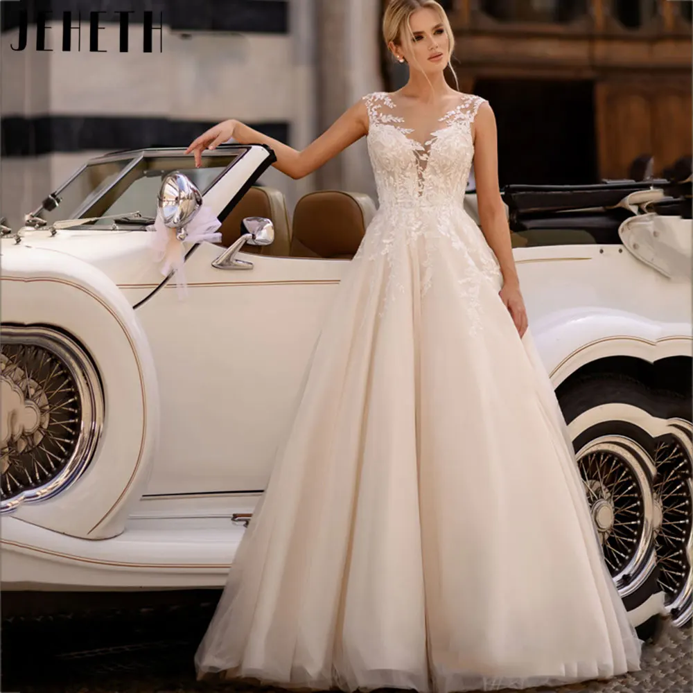JEHETH Luxurious A-Line V-Neck Wedding Gowns Classic Lace Appliques Bridal Dress Backless Sleeveless Buttons Vestido De Noiva
JEHETH Luxurious A-Line V-Neck Wedding Gowns Classic Lace Appliques Bridal Dress Backless Sleeveless Buttons Vestido De Noiva