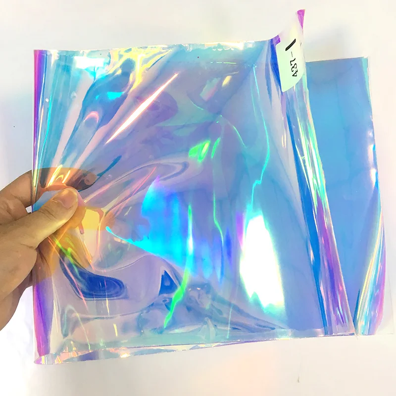 Fuux Leather Fabric Roll Iridescent Film Dichroic Lamination Holographic Breathable TPU Film For Bags and shoes 30*135CM
Fuux Leather Fabric Roll Iridescent Film Dichroic Lamination Holographic Breathable TPU Film For Bags and shoes 30*135CM