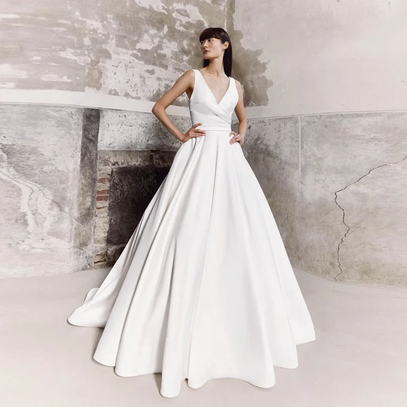 Demure V Shape Neck And Back Satin Wedding Dress With Bow Puffy A-line Pleated Floor Length Prom Evening Gowns vestido de novia
Demure V Shape Neck And Back Satin Wedding Dress With Bow Puffy A-line Pleated Floor Length Prom Evening Gowns vestido de novia