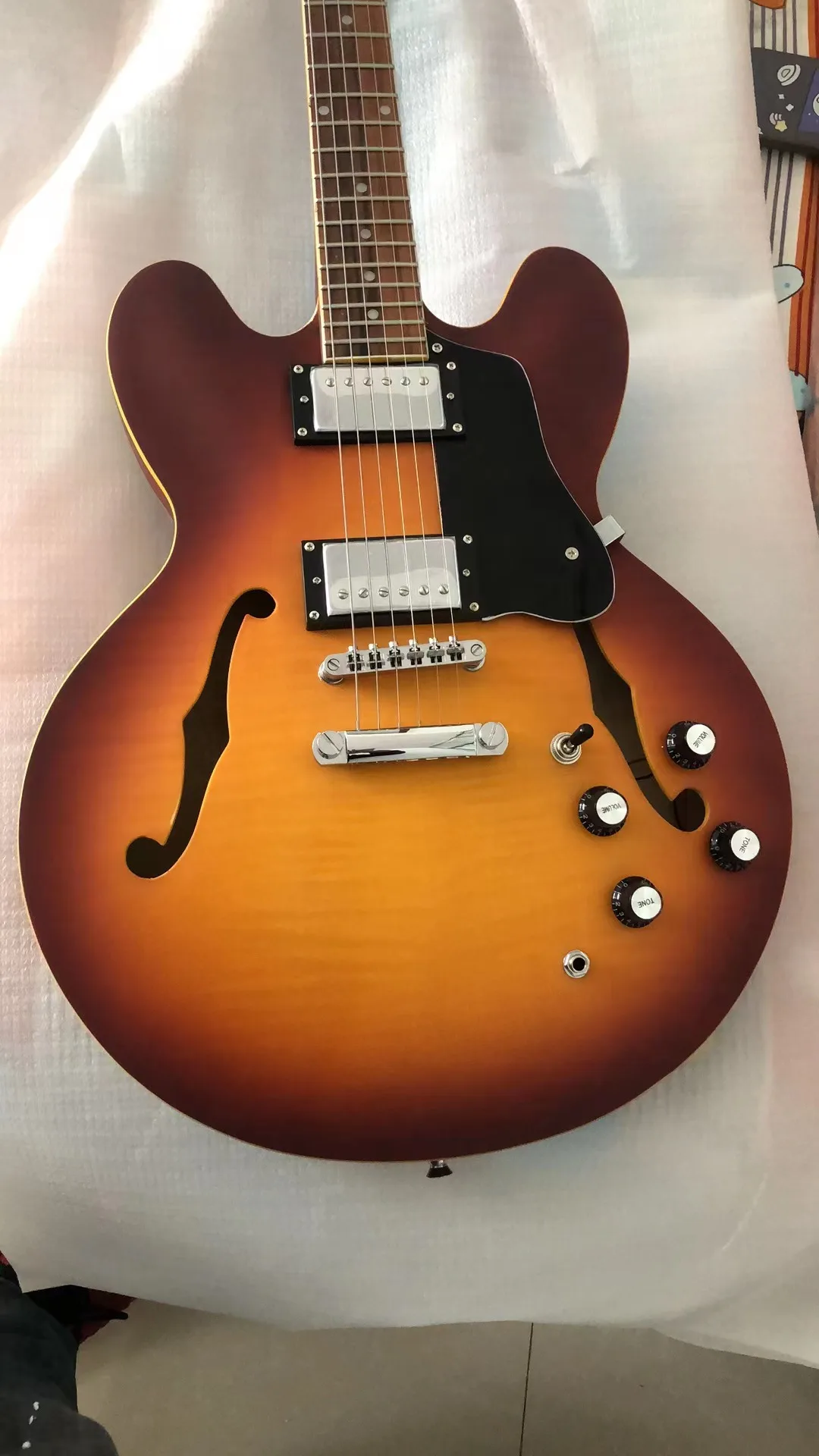 Matt Finish Sunburst 6 Strings Electric Guitar Semi-Hollow Jazz Electric Guitar Free Delivery
Matt Finish Sunburst 6 Strings Electric Guitar Semi-Hollow Jazz Electric Guitar Free Delivery