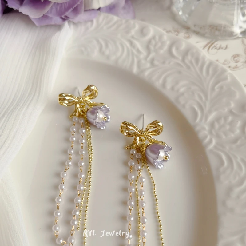 French Sweet Early Spring Orchid Bell Original Design Handmade 925 Silver Needle Bow Long Pearl Tassel Earrings
French Sweet Early Spring Orchid Bell Original Design Handmade 925 Silver Needle Bow Long Pearl Tassel Earrings