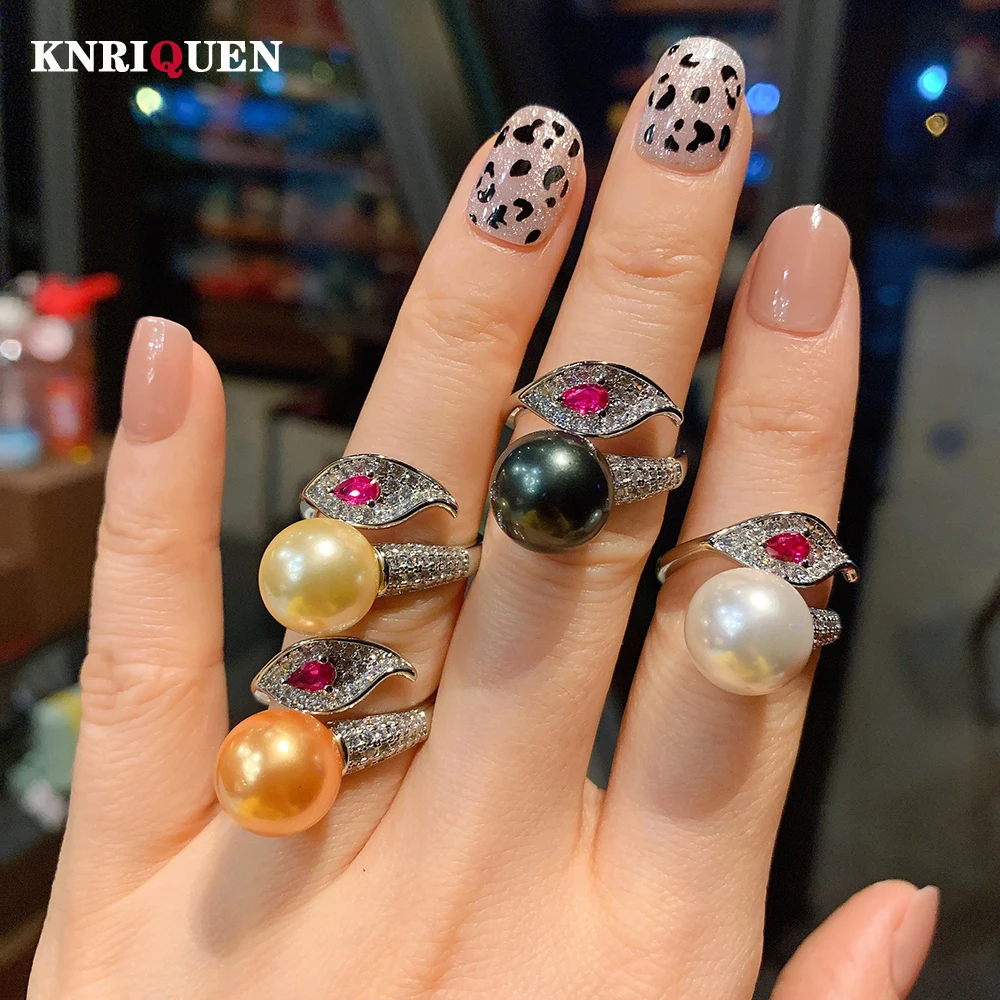 Charms 925 Sterling Silver 12MM Big Pearl Ruby Adjustable Ring for Women High Carbon Diamond Cocktail Party Fine Jewelry Gift
Charms 925 Sterling Silver 12MM Big Pearl Ruby Adjustable Ring for Women High Carbon Diamond Cocktail Party Fine Jewelry Gift