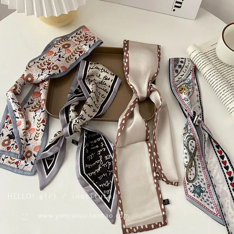 South Korea East Gate slender narrow silk scarf retro French ribbon scarf tie bag silk ribbon machine print hair band
South Korea East Gate slender narrow silk scarf retro French ribbon scarf tie bag silk ribbon machine print hair band