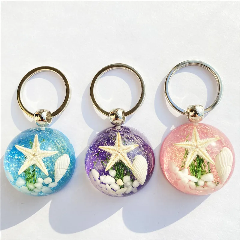 1Pcs New Starfish Resin Keychain Pendant Summer Style Creative Ocean Specimen Keychain Jewelry wedding Party Gift
1Pcs New Starfish Resin Keychain Pendant Summer Style Creative Ocean Specimen Keychain Jewelry wedding Party Gift