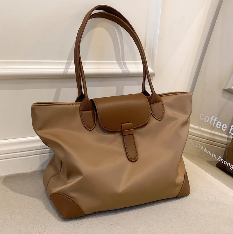 2023 New Stylish Oxford Cloth Women's Tote Bag with Large Capacity, Minimalist Design, Casual Charm, and Versatile Functionality
2023 New Stylish Oxford Cloth Women's Tote Bag with Large Capacity, Minimalist Design, Casual Charm, and Versatile Functionality