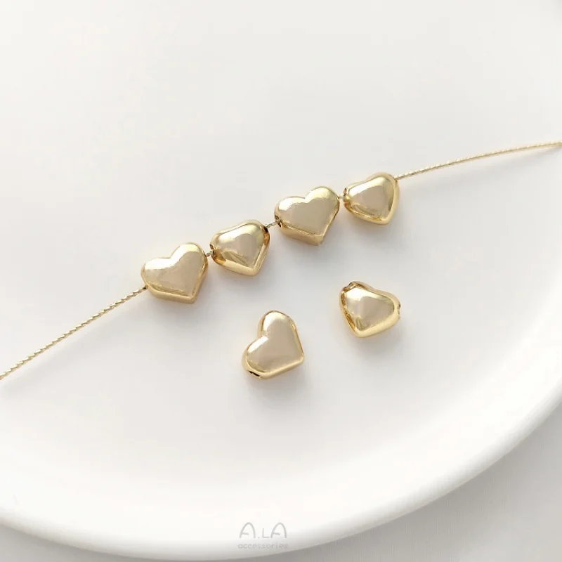 Wrapped gold color preservation through peanut heart spacer bead string hole love handmade DIY string bracelet necklace handmade
Wrapped gold color preservation through peanut heart spacer bead string hole love handmade DIY string bracelet necklace handmade