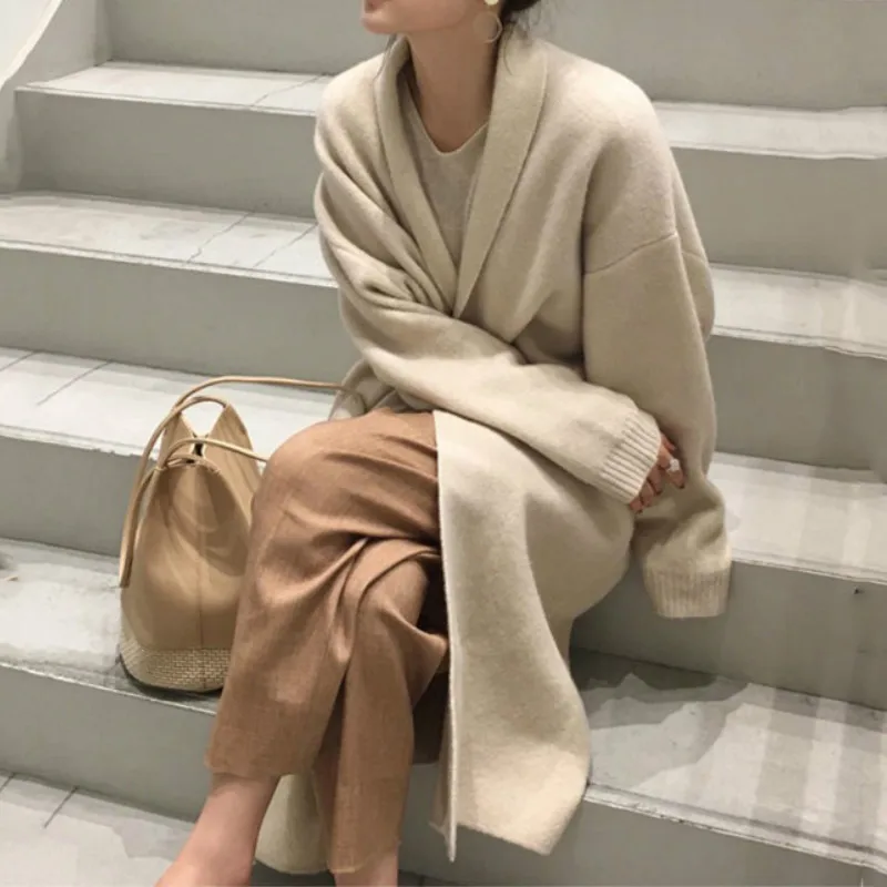 Autumn Fashion Solid V-Neck Outerwear Female Tops Women Winter Long Paragraph Knit Cardigan Loose Long Sleeves Sweater Jackets
Autumn Fashion Solid V-Neck Outerwear Female Tops Women Winter Long Paragraph Knit Cardigan Loose Long Sleeves Sweater Jackets