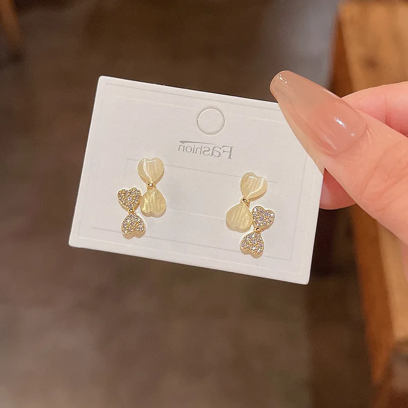 S925 Silver Needle Light Luxury Small Number Asymmetrical Bow Tie Earrings Female Super Fairy Versatile Temperament Cat's Eye
S925 Silver Needle Light Luxury Small Number Asymmetrical Bow Tie Earrings Female Super Fairy Versatile Temperament Cat's Eye
