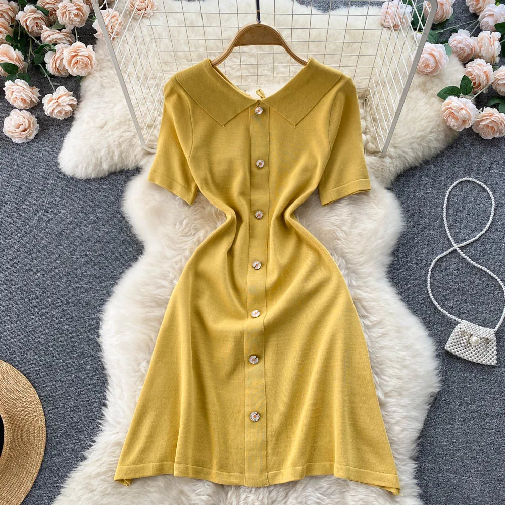 Summer New French Sweet Doll Collar Single-breasted Waist Dress Women's Retro Slim Solid Color Simple Mid-length Holiday Skirt 
Summer New French Sweet Doll Collar Single-breasted Waist Dress Women's Retro Slim Solid Color Simple Mid-length Holiday Skirt