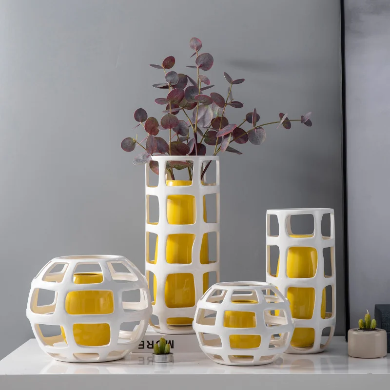 Life decoration industry Nordic modern simple ceramic vase fashion hollowed out modern home living room wine cabinet decoration
Life decoration industry Nordic modern simple ceramic vase fashion hollowed out modern home living room wine cabinet decoration
