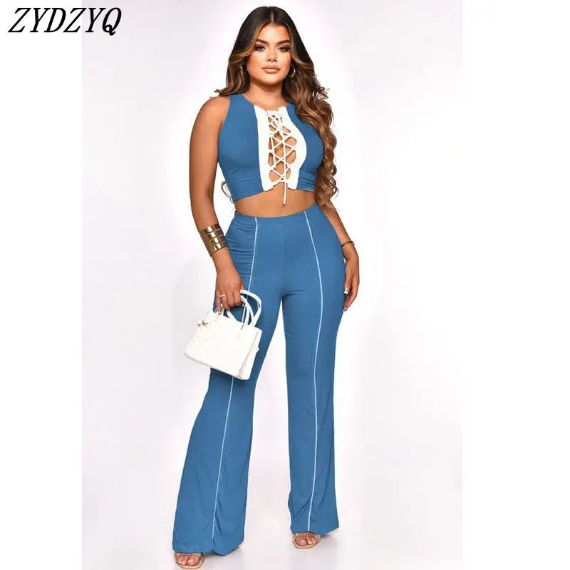 ZYDZYQ Two Pieces Set Women Spring Summer Lace-up Hollow Vest Flared Pants Sets Y2k Clothes Vacation Outfit Streetwear Wholesale
ZYDZYQ Two Pieces Set Women Spring Summer Lace-up Hollow Vest Flared Pants Sets Y2k Clothes Vacation Outfit Streetwear Wholesale
