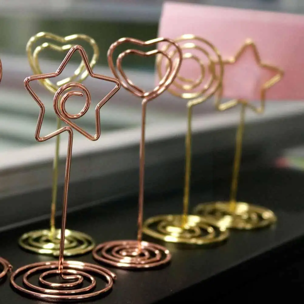 10pcs Golden Heart Star Shape Photo Holder Stands Table Number Holders Place Card Paper Menu Clips For Wedding Party Office J1u0
10pcs Golden Heart Star Shape Photo Holder Stands Table Number Holders Place Card Paper Menu Clips For Wedding Party Office J1u0