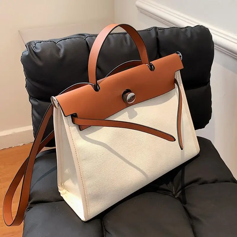 2021 Ladies Tote Bag Fashion Canvas Handbag Stitching Contrast Color Shoulder Bag Casual Messenger Bag Large Capacity
2021 Ladies Tote Bag Fashion Canvas Handbag Stitching Contrast Color Shoulder Bag Casual Messenger Bag Large Capacity