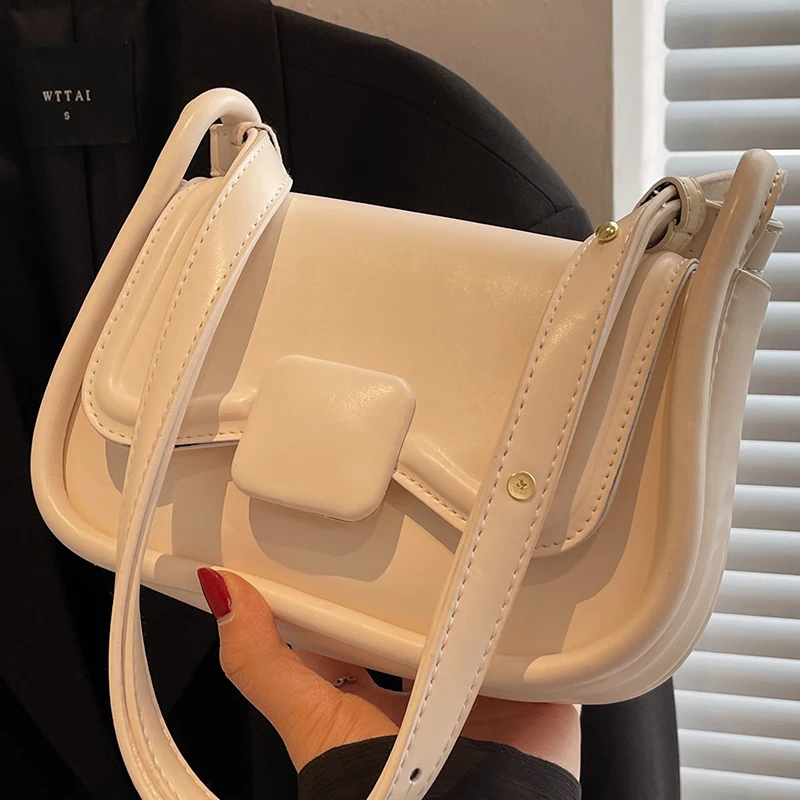 Белая сумка на плечо для женщин, маленькие дамские сумочки через плечо из искусственной кожи с клапаном, оригинальные мини-кошельки в эстет...
Белая сумка на плечо для женщин, маленькие дамские сумочки через плечо из искусственной кожи с клапаном, оригинальные мини-кошельки в эстет...