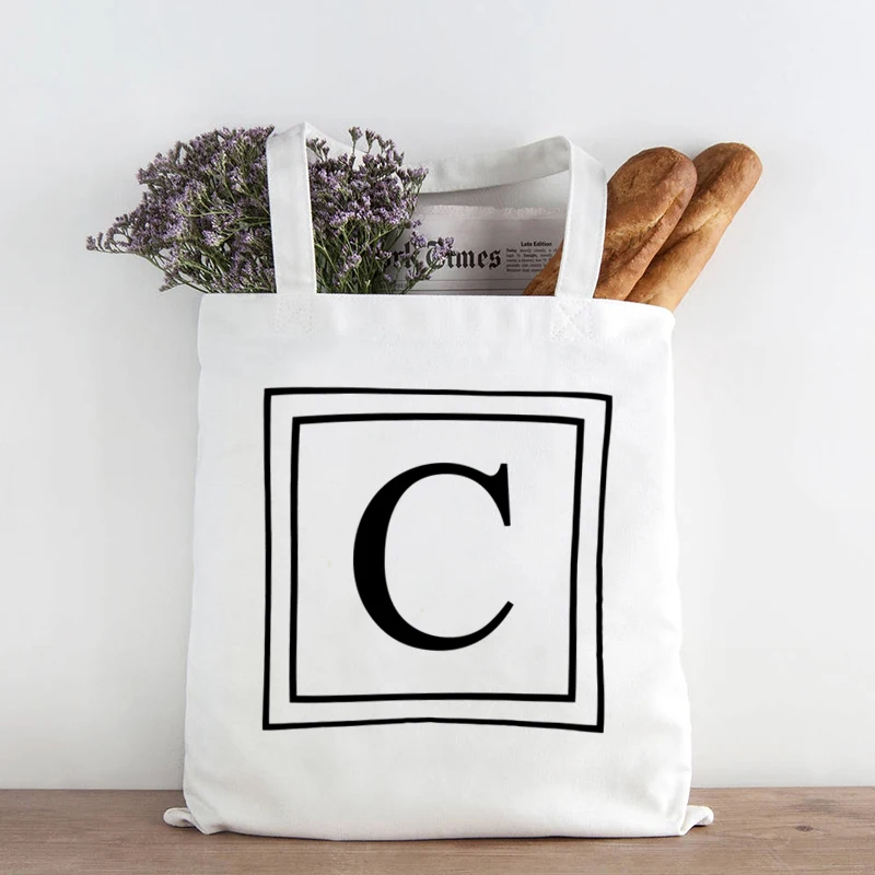 Дамские сумочки для покупок в стиле Харадзюку с надписью, вместительные холщовые сумки-тоуты для покупок с цветочным рисунком и надписью, с ... 
Дамские сумочки для покупок в стиле Харадзюку с надписью, вместительные холщовые сумки-тоуты для покупок с цветочным рисунком и надписью, с ...