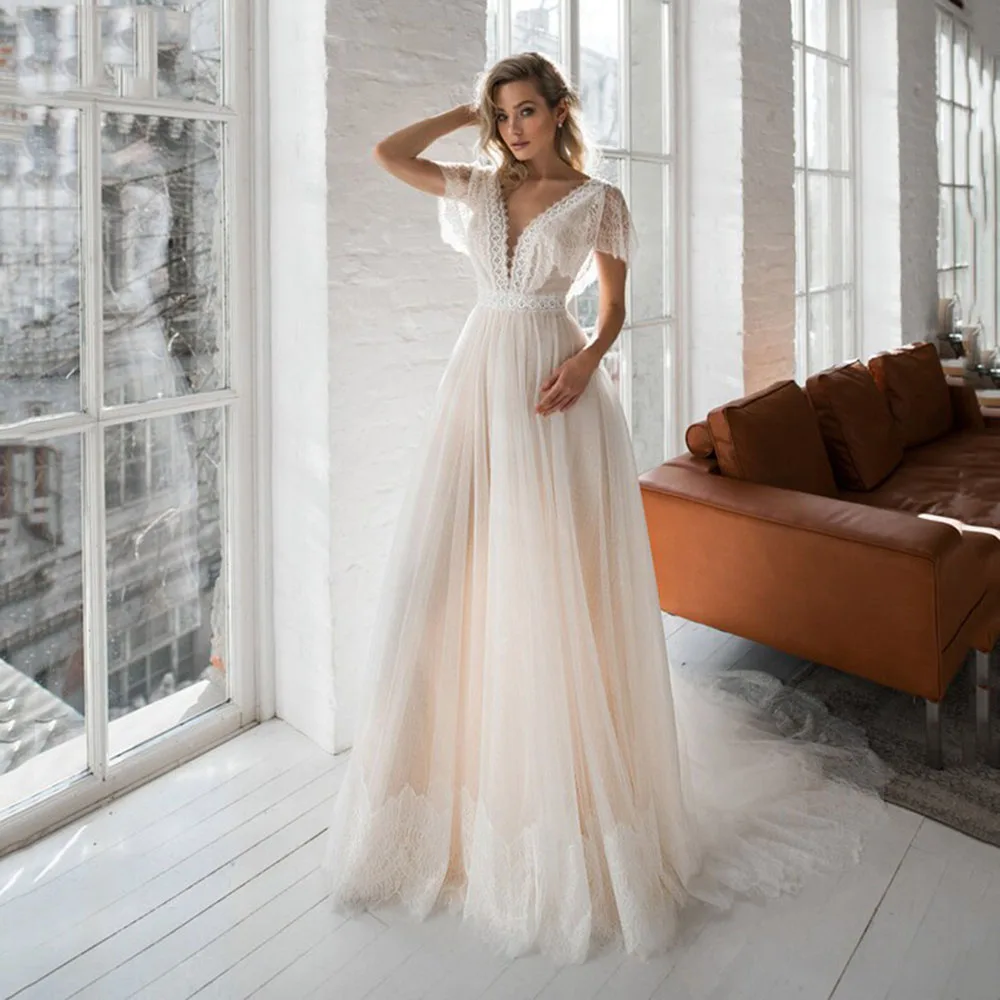 Msikoods Boho Champange Beach Wedding Dresses 2023 V Neck Backless Lace Cap Sleeves Bridal Dress Women Court Train Bride Gown
Msikoods Boho Champange Beach Wedding Dresses 2023 V Neck Backless Lace Cap Sleeves Bridal Dress Women Court Train Bride Gown