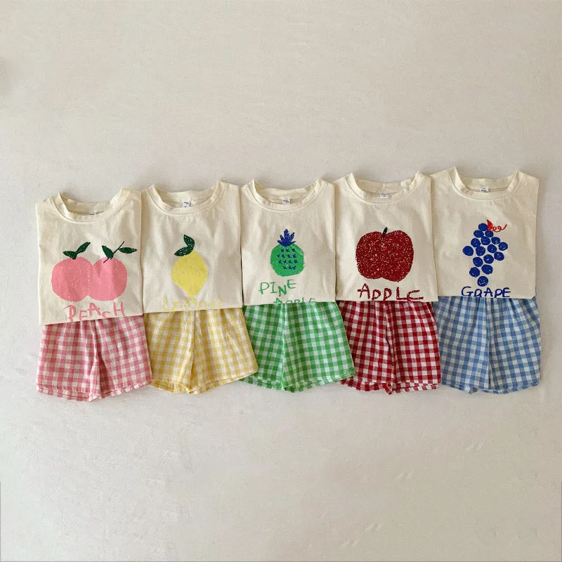 Cute Kids Clothes 2Pcs Set Baby Boys Girls Cotton Fruit Print Short Sleeve T-shirt + Plaid Shorts Children Outfits 2-6Y 
Cute Kids Clothes 2Pcs Set Baby Boys Girls Cotton Fruit Print Short Sleeve T-shirt + Plaid Shorts Children Outfits 2-6Y