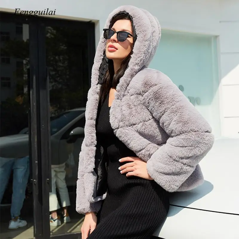 Winter Women's Fashion High-Quality Furry Faux Fur Coat Hooded Elegant Thick Warm Coat Fake Fur Coat
Winter Women's Fashion High-Quality Furry Faux Fur Coat Hooded Elegant Thick Warm Coat Fake Fur Coat