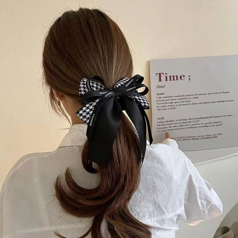 Hot black pleated hair ties houndstooth plaid fabric retro hair elastic bow hair rope fashion ladies new headwear accessories
Hot black pleated hair ties houndstooth plaid fabric retro hair elastic bow hair rope fashion ladies new headwear accessories