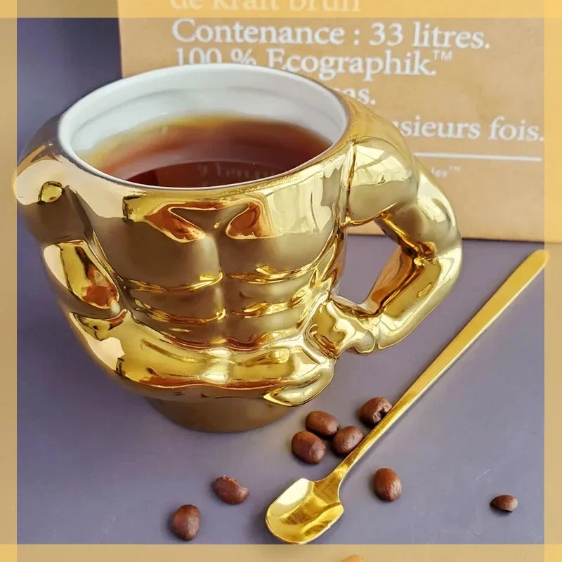 Creative Gold Muscle Man Mug Ceramic Coffee Cup Ceramic Mug with spoon Creative Personality Funny Water Cup Birthday Gift
Creative Gold Muscle Man Mug Ceramic Coffee Cup Ceramic Mug with spoon Creative Personality Funny Water Cup Birthday Gift