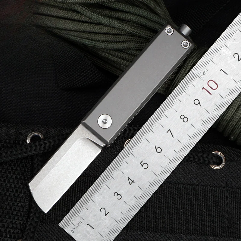 Outdoor a Folding Knife Functional Tapping Device Folding Knife Titanium Alloy S35vn Steel Mini Keychain Tool a Folding Knife
Outdoor a Folding Knife Functional Tapping Device Folding Knife Titanium Alloy S35vn Steel Mini Keychain Tool a Folding Knife