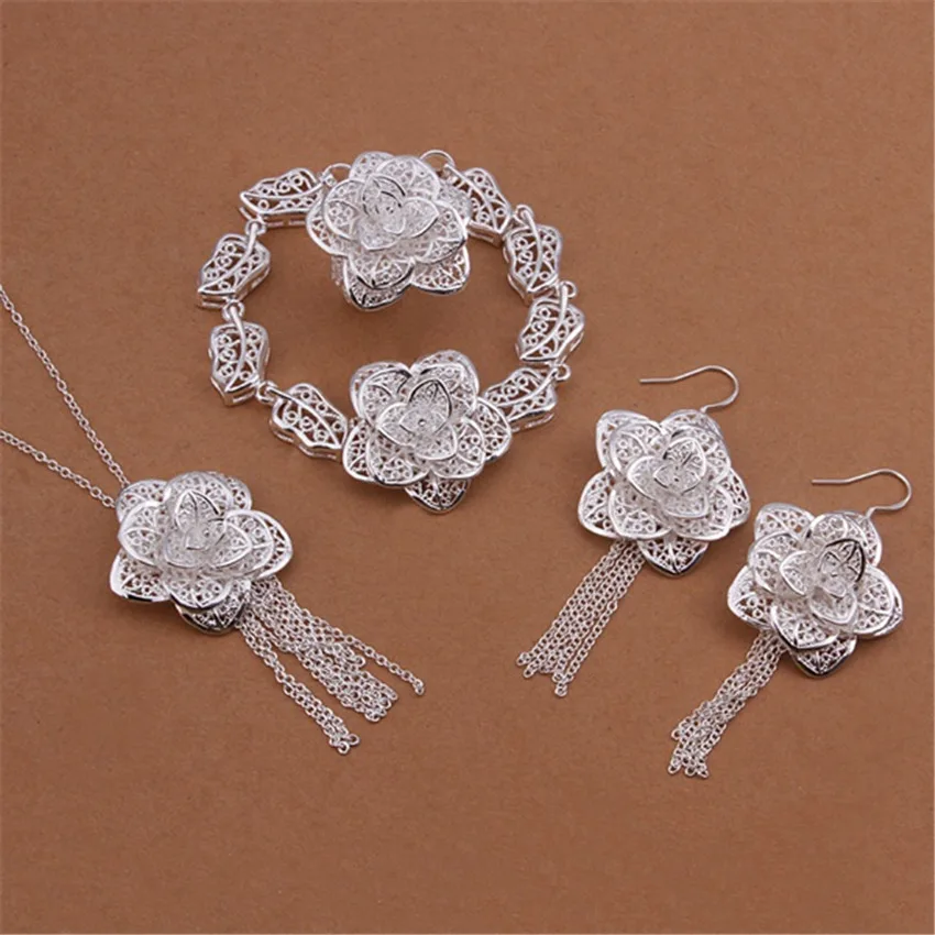 Комплект из колье, серёг, кольца и браслета, серебро 925 пробы 
Комплект из колье, серёг, кольца и браслета, серебро 925 пробы