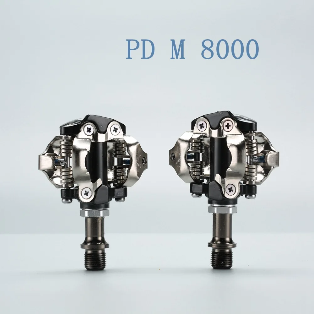 PD-M8000 M8020 Self-Locking SPD Pedals MTB Components Using for Bicycle Racing Mountain Bike Parts Pedal Lock Pedal with Buckle
PD-M8000 M8020 Self-Locking SPD Pedals MTB Components Using for Bicycle Racing Mountain Bike Parts Pedal Lock Pedal with Buckle