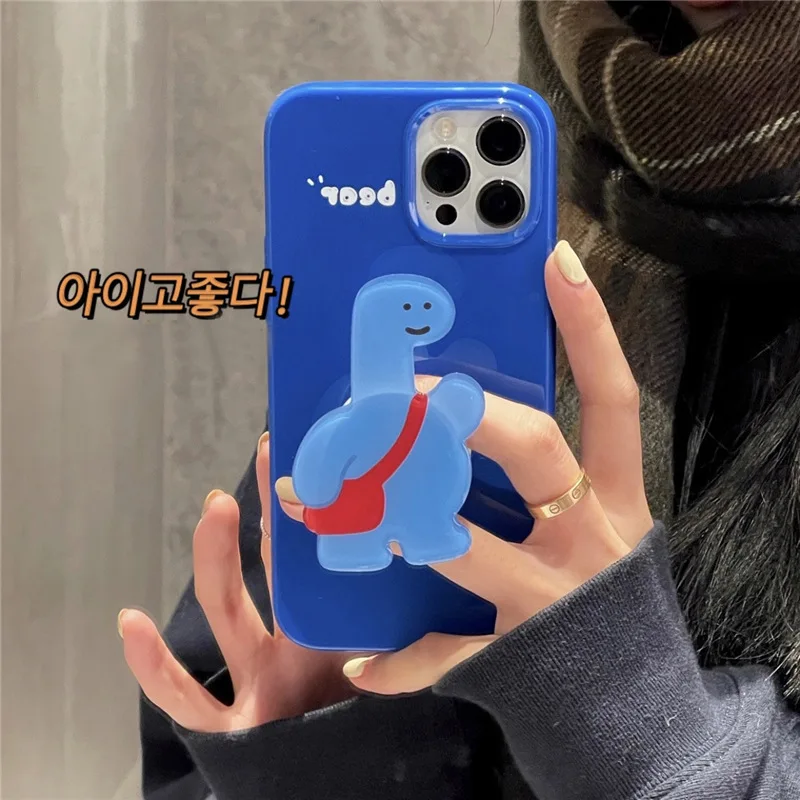 Phone Case with Cute Dinosaur Phone Grip Holder for Iphone 13 12 11 Pro Max Mini Case for Iphone Xr X Xs 7P 8Plus 7 8 Se 2020
Phone Case with Cute Dinosaur Phone Grip Holder for Iphone 13 12 11 Pro Max Mini Case for Iphone Xr X Xs 7P 8Plus 7 8 Se 2020