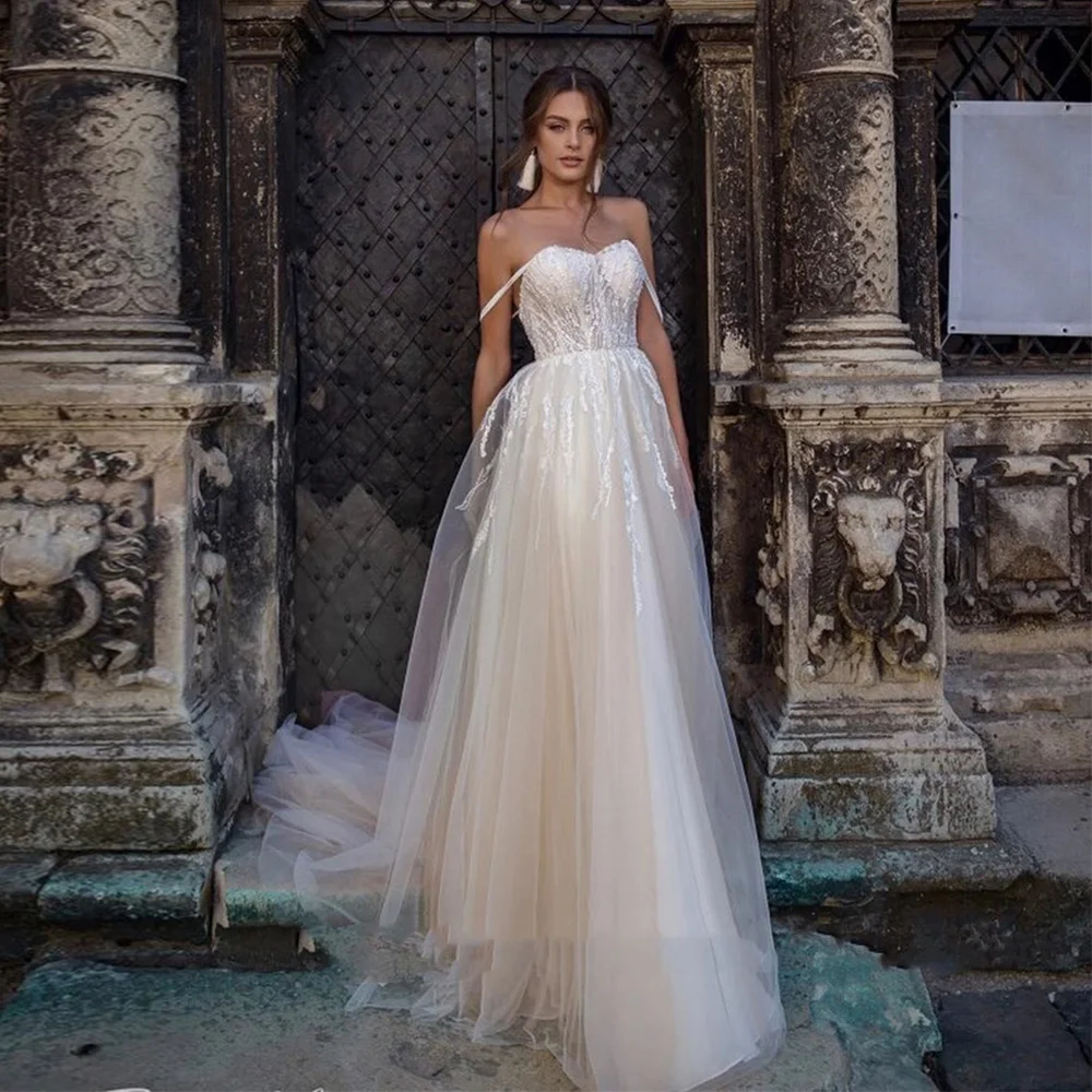 Exquisite Sweeetheart Wedding Dresses With Pearls And Beading Sexy Spaghetti Straps Backless Appliques Tulle Bridal Gowns
Exquisite Sweeetheart Wedding Dresses With Pearls And Beading Sexy Spaghetti Straps Backless Appliques Tulle Bridal Gowns