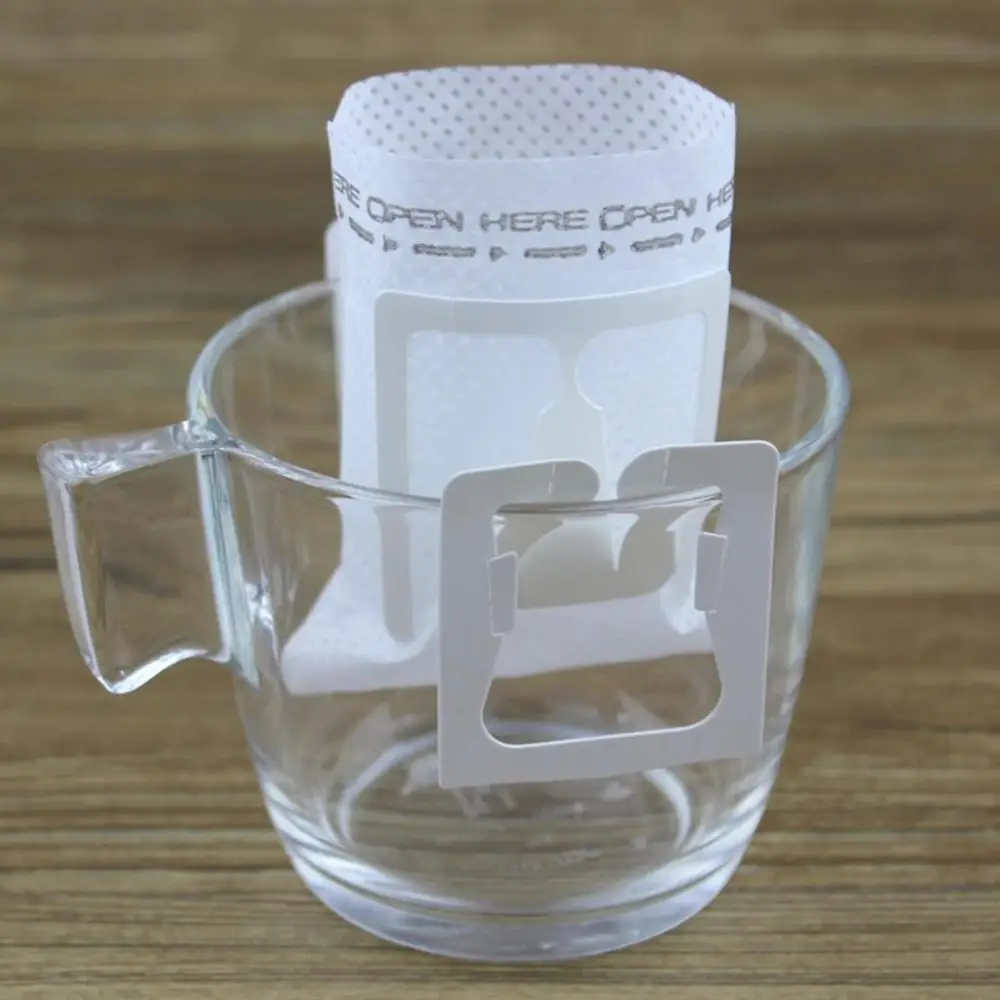 Portable 50Pcs Coffee Mesh Filter Bag Hanging Ear Style Drinking Pouch Tool Coffee Mesh Filter Ear Style Drinking Pouch Tool
Portable 50Pcs Coffee Mesh Filter Bag Hanging Ear Style Drinking Pouch Tool Coffee Mesh Filter Ear Style Drinking Pouch Tool