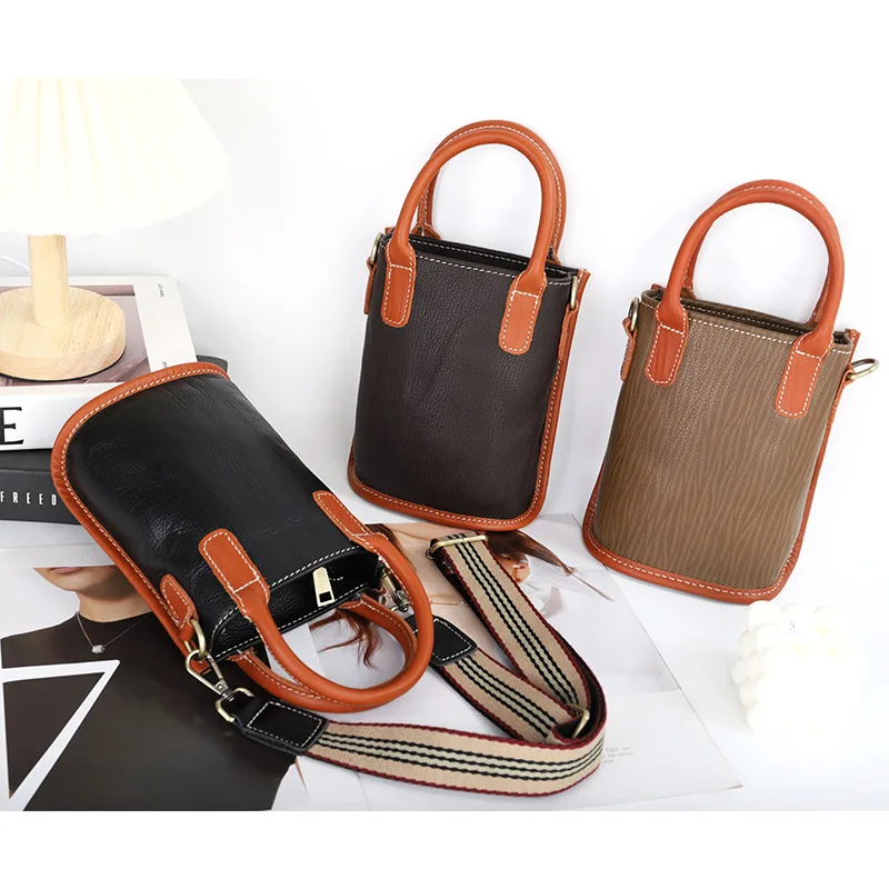 Retro Soft Leather Ladies Diagonal Bag New Top Layer Cowhide Mini Bucket Bag Wide Shoulder Strap Single Shoulder Small Bag
Retro Soft Leather Ladies Diagonal Bag New Top Layer Cowhide Mini Bucket Bag Wide Shoulder Strap Single Shoulder Small Bag