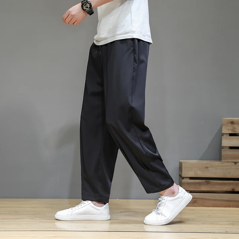 Мужские однотонные шаровары в стиле Харадзюку, повседневные брюки большого размера на завязках, весна-лето 2022
Мужские однотонные шаровары в стиле Харадзюку, повседневные брюки большого размера на завязках, весна-лето 2022