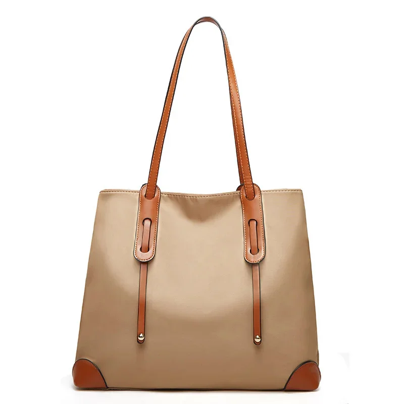 New Women's Tote Bag 2023 Korean Version High Capacity Shoulder Oxford Fabric Contrast Soft Leather Handheld
New Women's Tote Bag 2023 Korean Version High Capacity Shoulder Oxford Fabric Contrast Soft Leather Handheld
