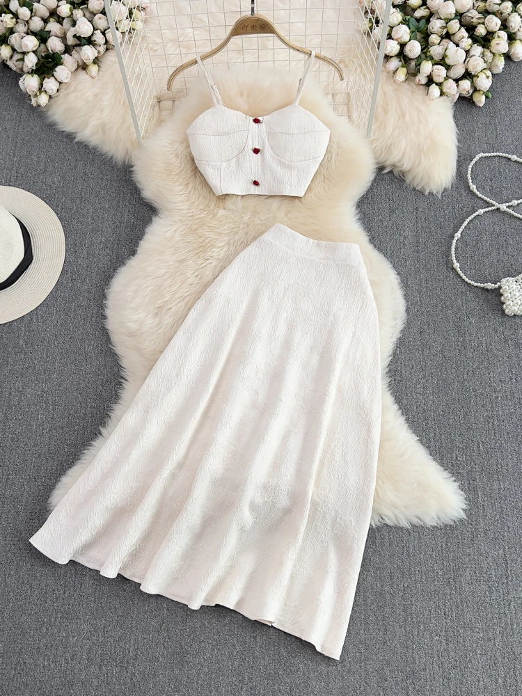 Женский пляжный комплект из двух предметов, летний пикантный укороченный топ и длинная юбка А-силуэта с высокой талией, винтажный костюм для женщин
Женский пляжный комплект из двух предметов, летний пикантный укороченный топ и длинная юбка А-силуэта с высокой талией, винтажный костюм для женщин