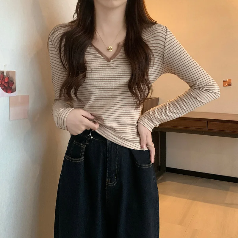 Женские рубашки с длинным рукавом и V-образным вырезом, облегающая футболка в Корейском стиле на раннюю осень 2022, Модный женский топ, одежда
Женские рубашки с длинным рукавом и V-образным вырезом, облегающая футболка в Корейском стиле на раннюю осень 2022, Модный женский топ, одежда