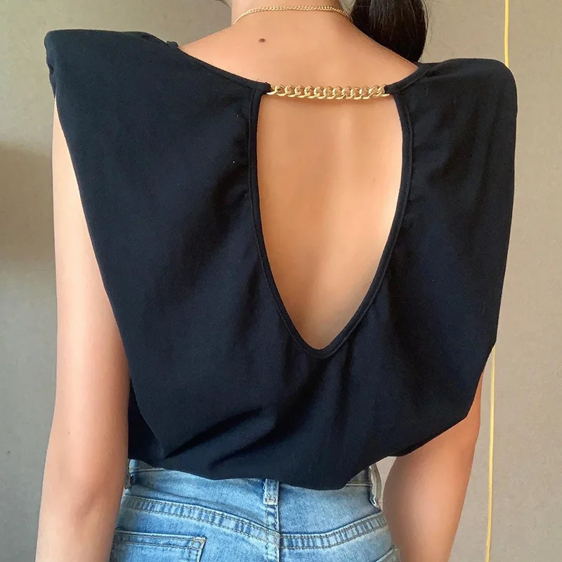 Black Casual Shoulder Padded Backless Metal Chain T-shirt Loose Female Ladies T Shirts Summer Sleeveless Tops Chic Fashion Sexy
Black Casual Shoulder Padded Backless Metal Chain T-shirt Loose Female Ladies T Shirts Summer Sleeveless Tops Chic Fashion Sexy
