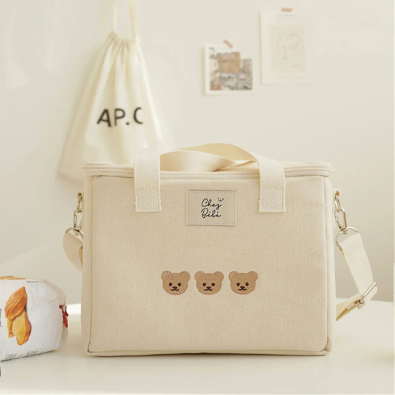 Portable Kids Lunch Bag Insulated Food Storage Bag with Strap Canvas Waterproof Thermal Insulation Box Bear Embroidery Mommy Bag
Portable Kids Lunch Bag Insulated Food Storage Bag with Strap Canvas Waterproof Thermal Insulation Box Bear Embroidery Mommy Bag