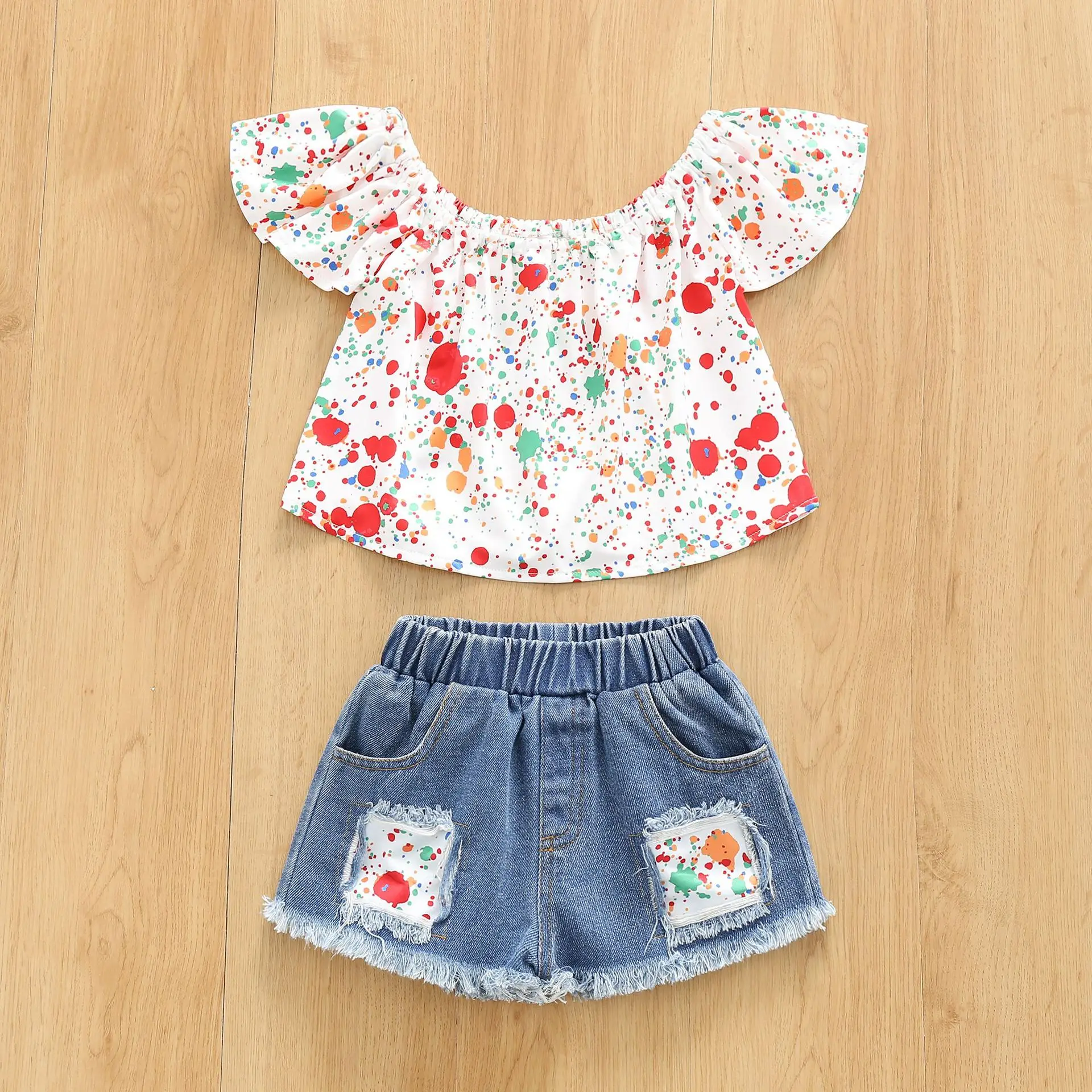 New Summer Children's Set Trend Girls' Printed Off Shoulder Top Denim Shorts Two Piece Set
New Summer Children's Set Trend Girls' Printed Off Shoulder Top Denim Shorts Two Piece Set