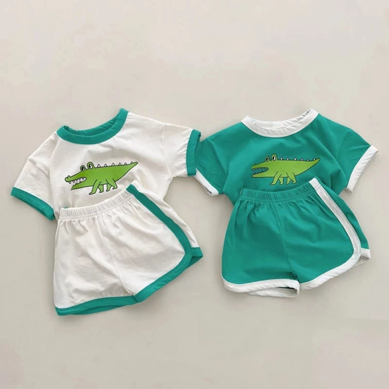 Summer Kids Baby Boy Girl Suit Children's Clothes Baby Boys Girls Short Sleeve Cartoon Dinosaur T-Shirt + Shorts Clothing Sets
Summer Kids Baby Boy Girl Suit Children's Clothes Baby Boys Girls Short Sleeve Cartoon Dinosaur T-Shirt + Shorts Clothing Sets