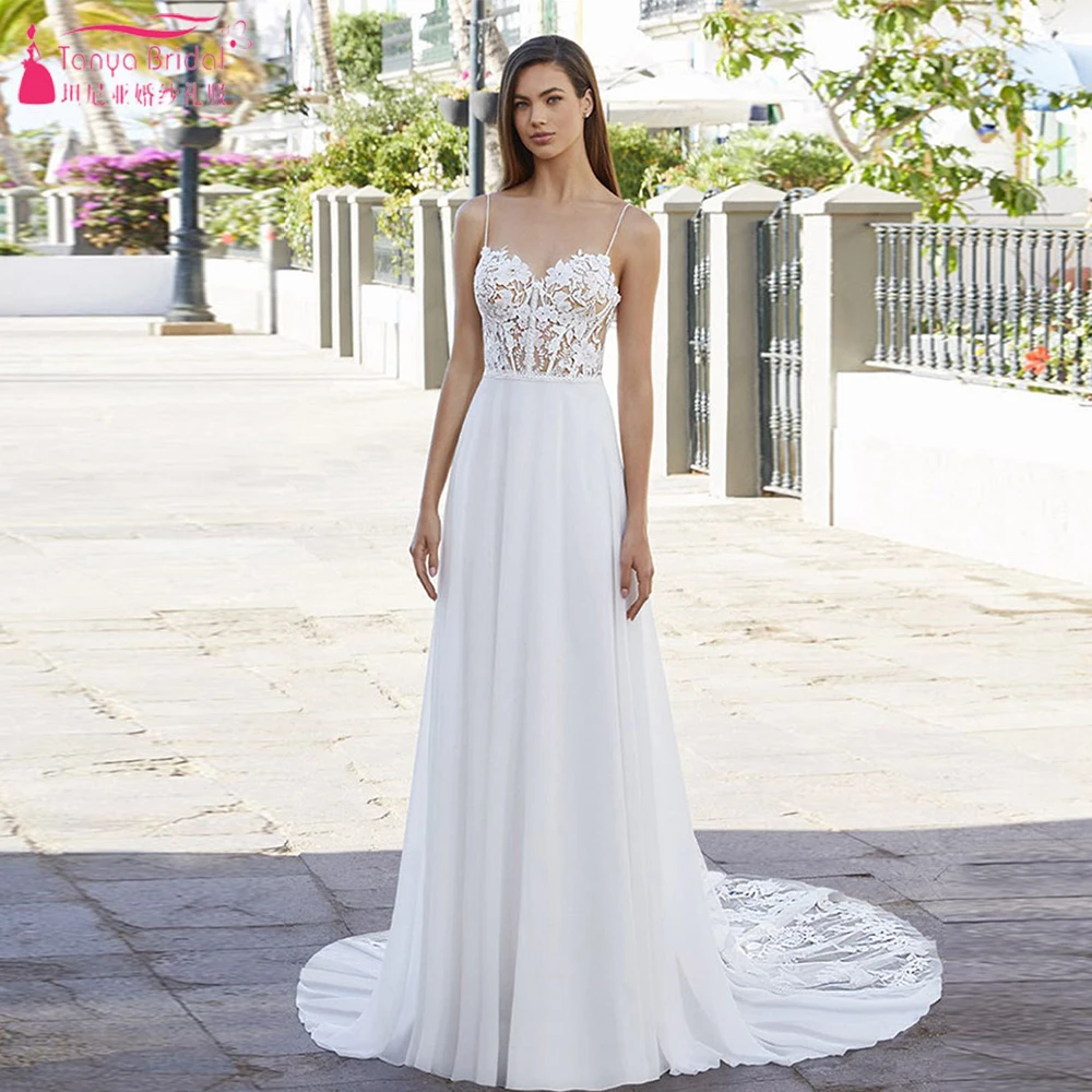 Whimsical A-line wedding dress With Low Scooped Back , Romantic Tulle Train, Covered Artistic Floral Embroidered Lace. ZW1030
Whimsical A-line wedding dress With Low Scooped Back , Romantic Tulle Train, Covered Artistic Floral Embroidered Lace. ZW1030